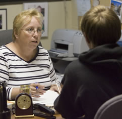 A student meeting with a faculty adviser.