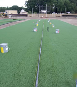 Getting the new baseball field ready