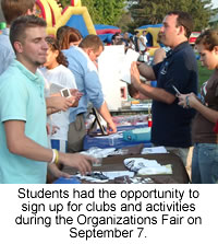 Students sign up for activities at the Organizations Fair.