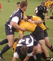 Students playing rugby.