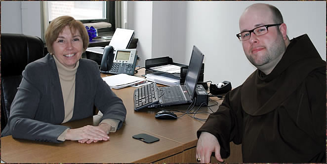 Pictured: Monica Mattioli, '77, and Br. Ross Chamberland, O.F.M.