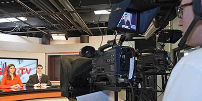 A student works the camera during an SBU-TV broadcast