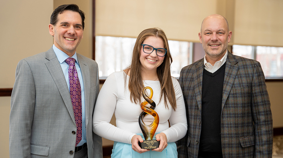2023 Woman of Promise Grace Foley with Jandoli School Dean Aaron Chimbel (left) and University President Dr, Jeff Gingerich