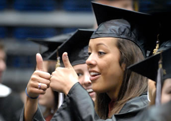 Andrea Doneth give the thumbs up during Commencement