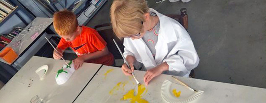 Students painting at art camp