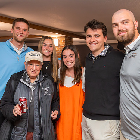 A group smiles during the 2026 Faculty/Staff/Senior Reception