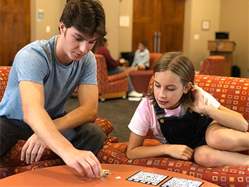 Student mentoring another.