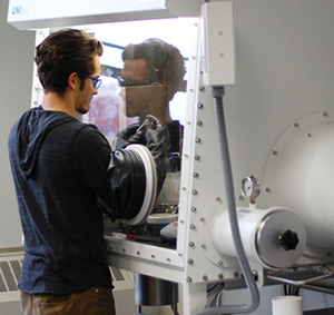 A student works in the Glove Box.