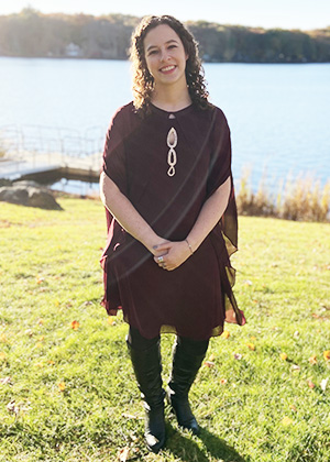 Francesca DiCillo stands in front of a lake