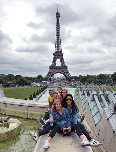 Students outside the Eiffel Tower in Paris