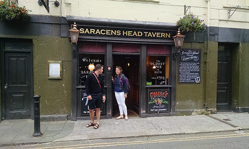 Two students at the door of Saracens Pub