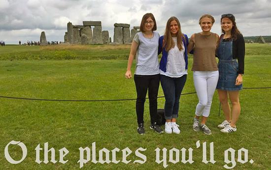 Visit to Stonehenge Four students standing in front of Stonehenge