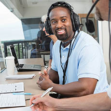 Student in sports press box