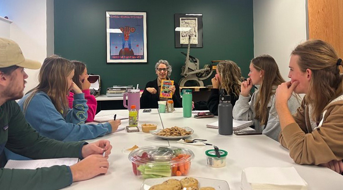 Novelist and university press editor Jennifer Savran Kelley with students