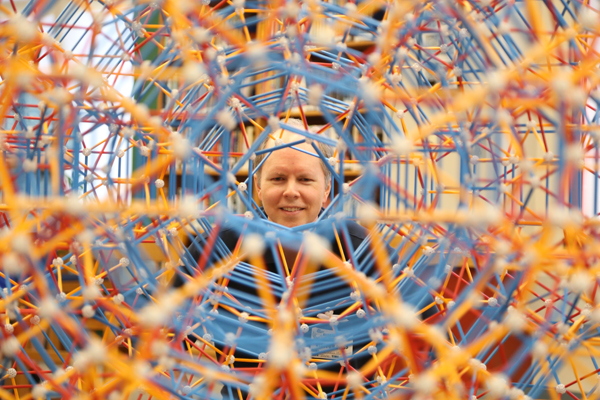 A view of Dr. Hill through one of the pentagonal tunnels.