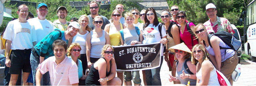 Students posing with a St. Bonaventure banner in China