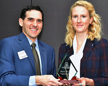 Hellinger award Jandoli School Dean Aaron Chimbel with 2019 Hellinger winner Michael Clare Nelson