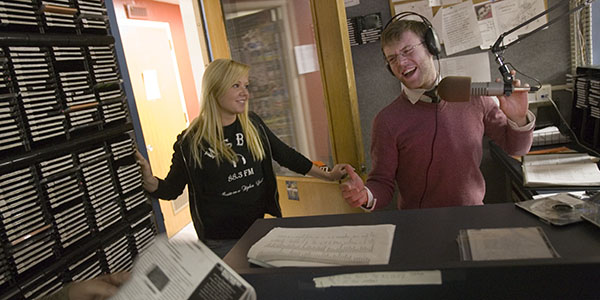 A DJ on the air at WSBU-FM Radio