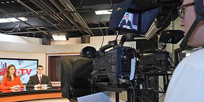 Put your education to work A student works the camera during an SBU-TV broadcast