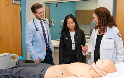 Health professions students in lab.