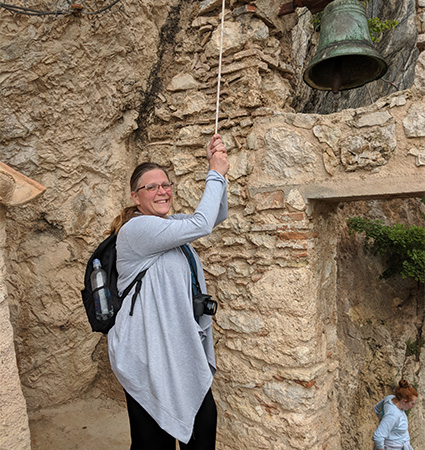 Pictured_Jennifer Landow ringing bell while on pilgrimage