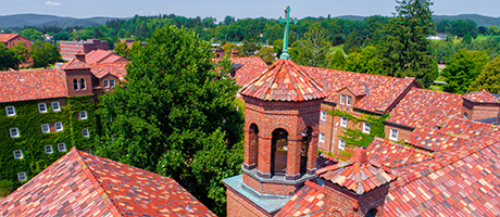 Closeup of bell tower and roof tiles on Devereux Hall