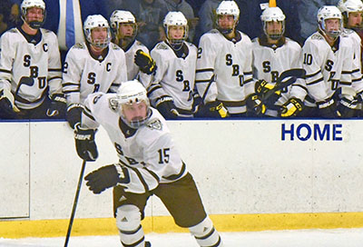 Hockey players on the ice in Olean