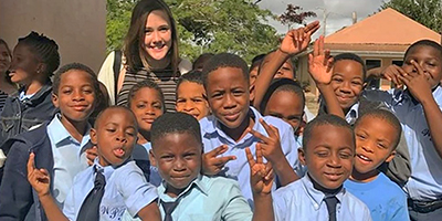SBU Enactus A Bonaventure student with students from a school in the Bahamas