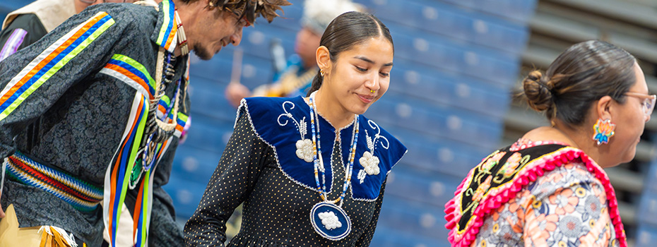 Indigenous Spirit Dancers in the Reilly Center.