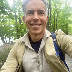 A selfie of Dr. Harris in the forest