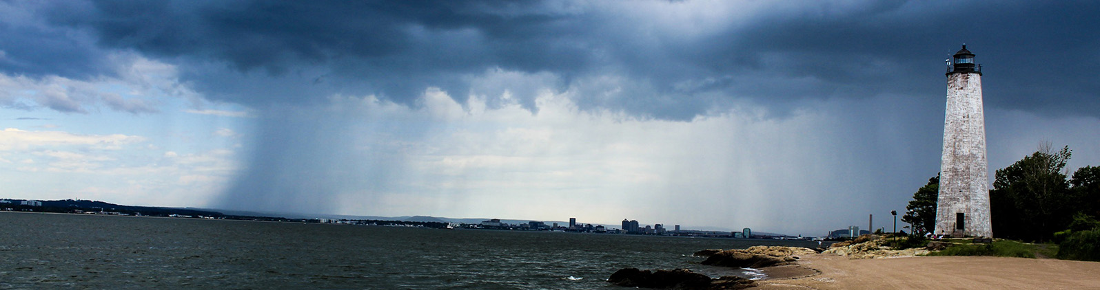Untitled, by Julia Wesche '20 Lighthouse during a thunderstorm