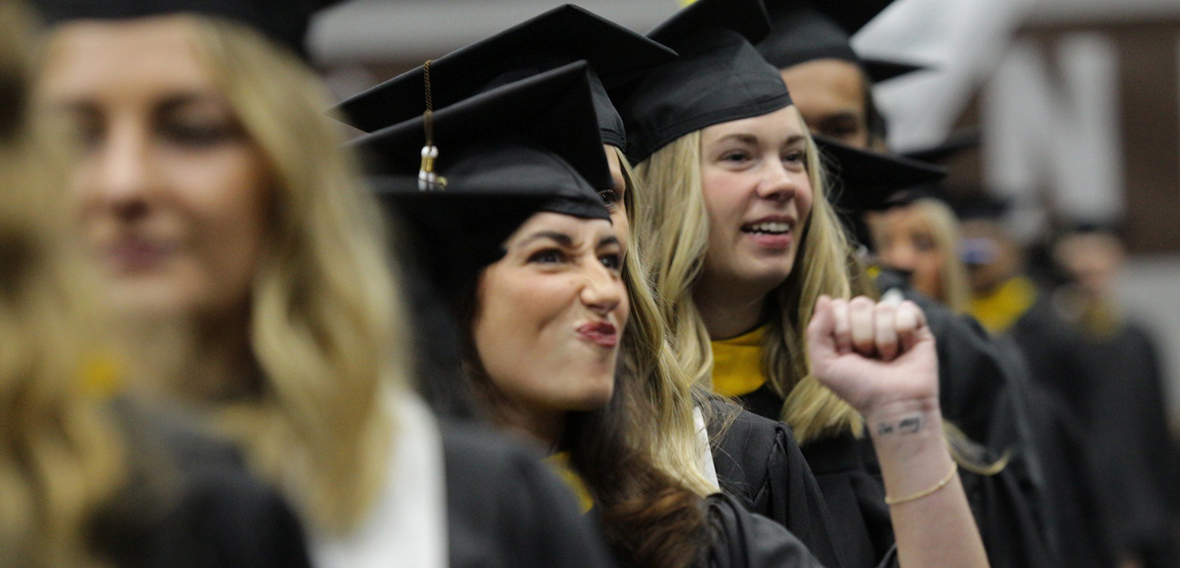 Students process into the Reilly Center Sunday morning.