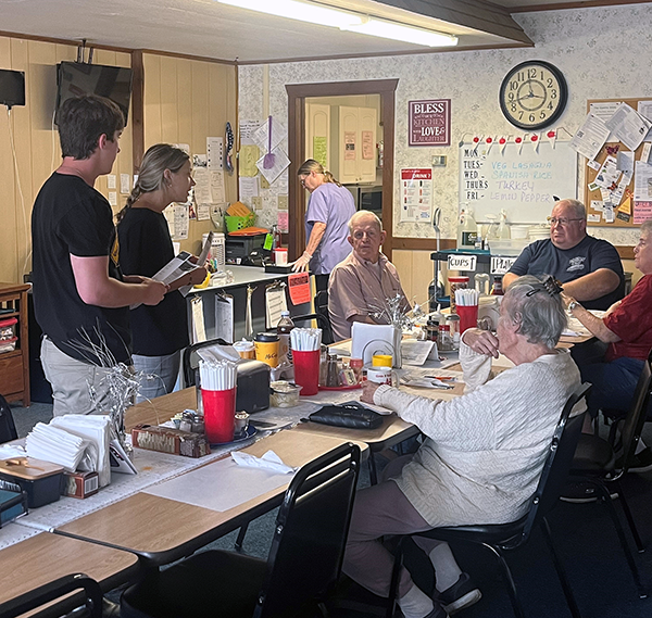 St. Bonaventure Mother Cabrini interns talk with senior citizens at the Senior Wellness & Nutrition Site in Delevan about fall prevention. St. Bonaventure Mother Cabrini interns talk with senior citizens at the Senior Wellness & Nutrition Site in Delevan about fall prevention.