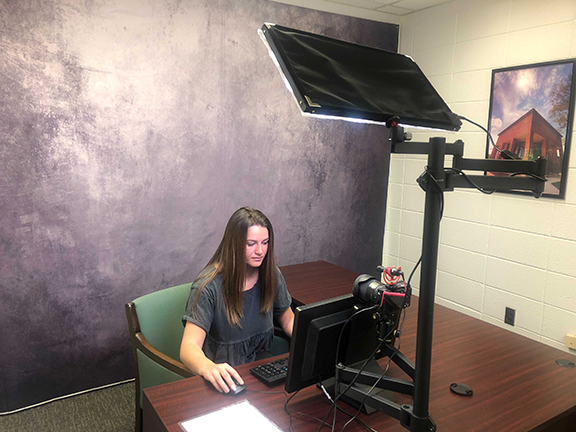 SBU student in the digital engagement room