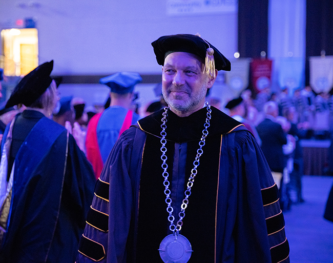 Dr. Gingerich processes out of the arena.