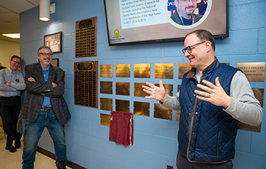 Adrian Wojnarowski shares a story about Vaccaro (left) from their college days