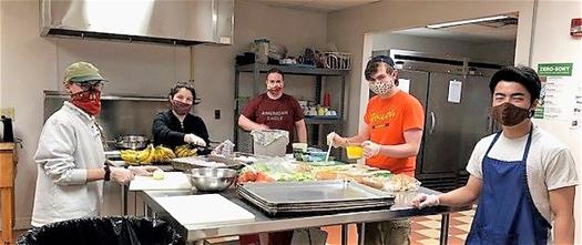 Students Lindsey Lytle, Valentina Cossio, Nate Parish, Will McDonough and Hiryu Waseda work at the Warming House.