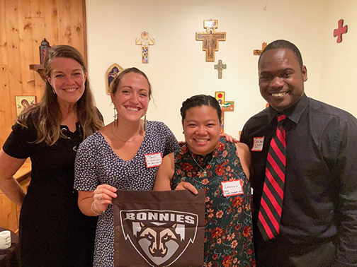 St. Bonaventure alumni serving with Franciscan Mission Service are (from left) Mari Snyder (overseas lay missioner on the U.S.-Mexico border), Victoria Wangler (DC Service Corps volunteer), Lauren Barry (DC Service Corps volunteer), and Joshua Maxey (former DC Service Corps volunteer and current FMS board member). 