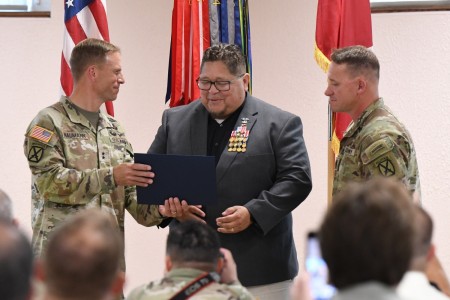 Frank Morales receiving his honor