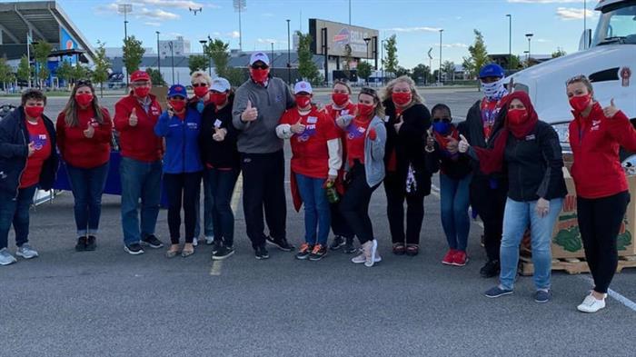 From Buffalo Bills Jim Kelly Instagram_with Bonaventure alumni at the Huddle for Hunger food drive From Buffalo Bills Jim Kelly Instagram_with Bonaventure alumni at the Huddle for Hunger food drive