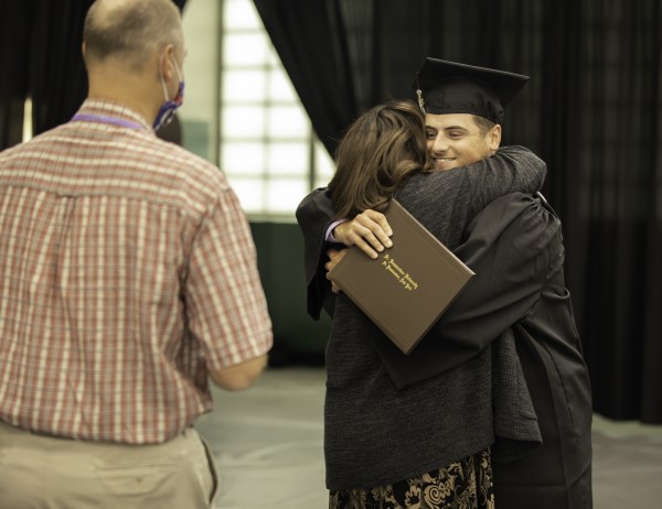 Hugging_mom college student