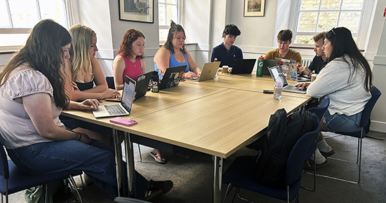 St. Bonaventure students at the University of Oxford’s Trinity College work on a conference presentation.