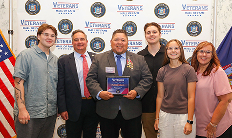 Pictured here at the ceremony in Albany are (from left): Christian Morales, Sen. Borrello, Frank Morales, Julian Morales, Isabella Morales and Crystal Morales, Frank’s wife.