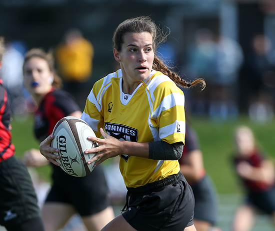 Ashlee Reid carries the ball vs. Rochester Sept. 24 in a 50-0 win