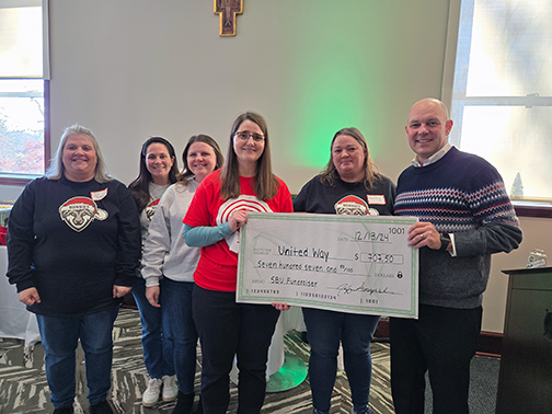 United Way check passing photo