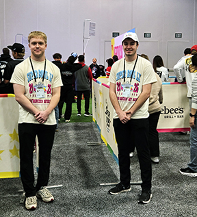 Aidan Swayze and Hayden Watt were tasked with assisting fans with their One Pass app as they enter the 